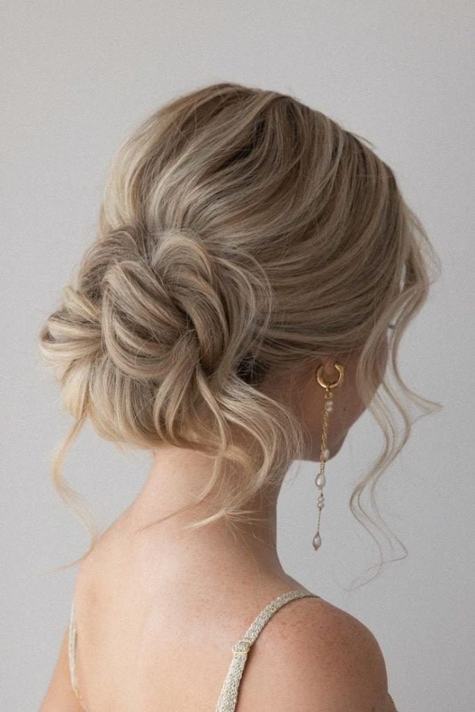 Elegant Ash Blonde Textured Low Bun, Face Framing Pieces Elegant Ash Blonde Textured Low Bun, Face Framing Pieces — Trendy Elegant Updo