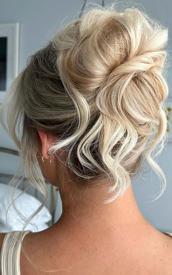 Blonde Messy Updo With Loose Tendrils Blonde Messy Updo With Loose Tendrils — Trendy Elegant Updo