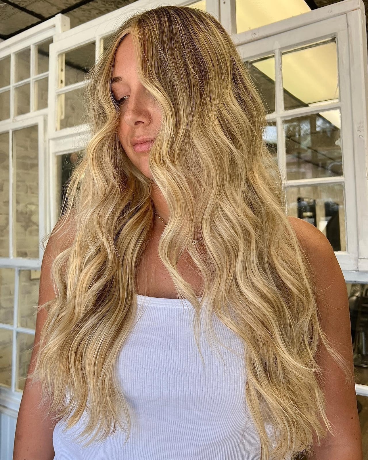Long Layered Golden Blonde With Face-Framing Highlights — Trendy Golden Blonde Hair