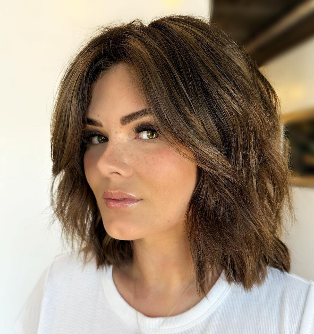 Chin Length Textured Bob With Side-Swept Bangs Chin Length Textured Bob With Side-Swept Bangs — Trendy Medium Hair