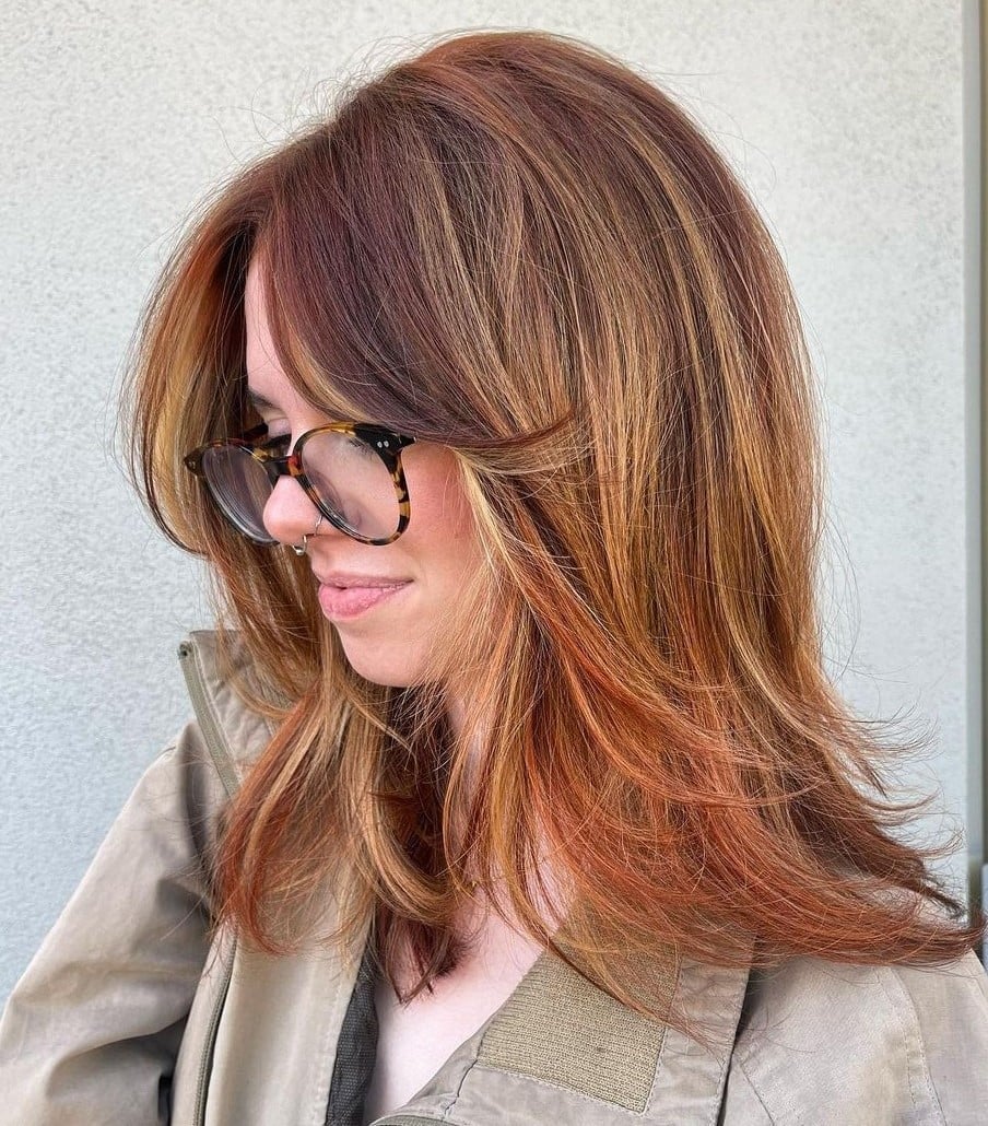 Shoulder Length Shag With Vibrant Highlights Shoulder Length Shag With Vibrant Highlights — Trendy Medium Hair