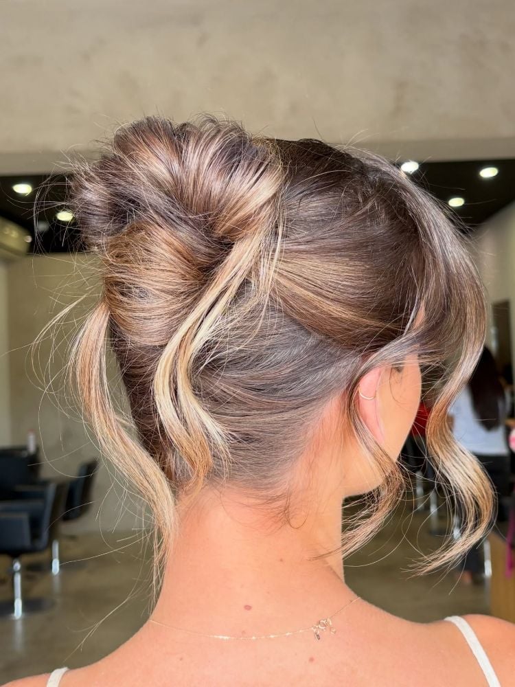 Textured High Bun Light Brown Blonde Highlights Textured High Bun Light Brown Blonde Highlights — Trendy Natural Bun
