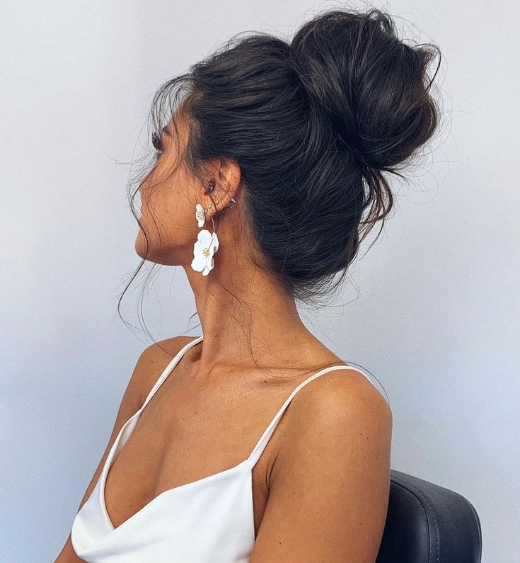 Effortless High Messy Bun Dark Brown, The Parting Appears To Be Middle Effortless High Messy Bun Dark Brown, The Parting Appears To Be Middle — Trendy Natural Bun