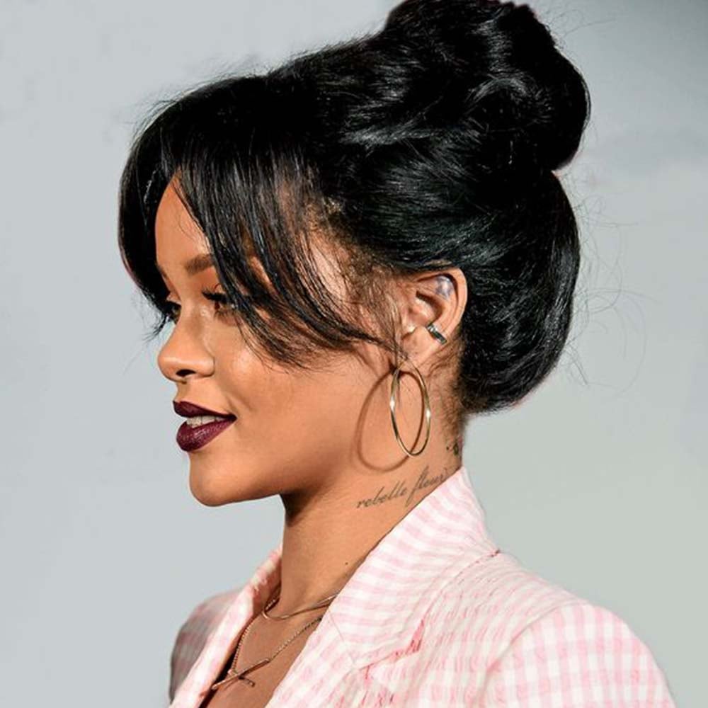 Large Voluminous Black Bun With Curtain Bangs Large Voluminous Black Bun With Curtain Bangs — Trendy Natural Bun
