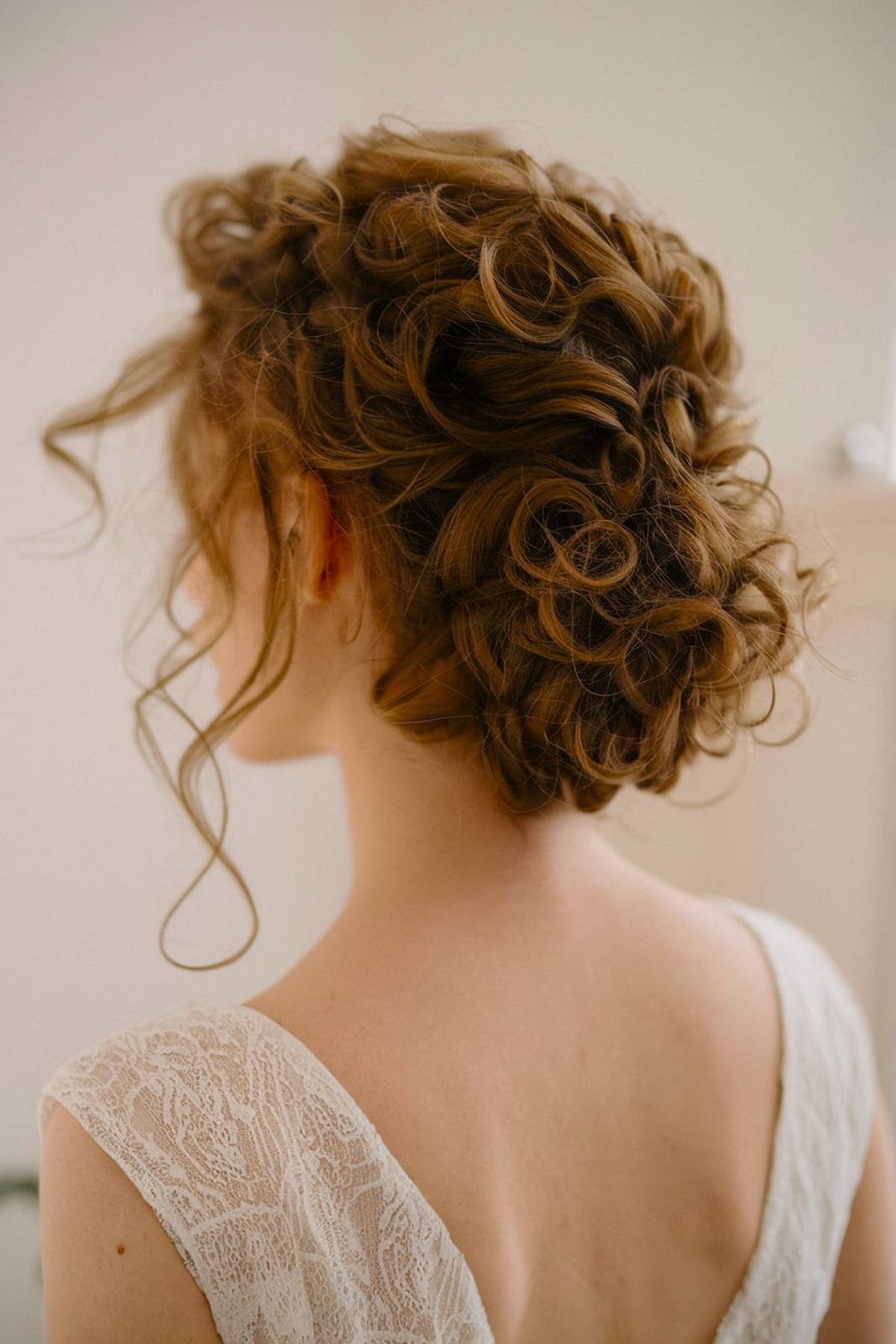 Loose Auburn Curly Updo With Tendrils Loose Auburn Curly Updo With Tendrils — Trendy Natural Bun