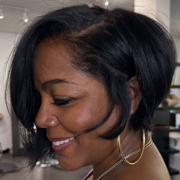 Asymmetrical Bob With Side-Swept Bangs Asymmetrical Bob With Side-Swept Bangs — Trendy Natural Hair Black Women