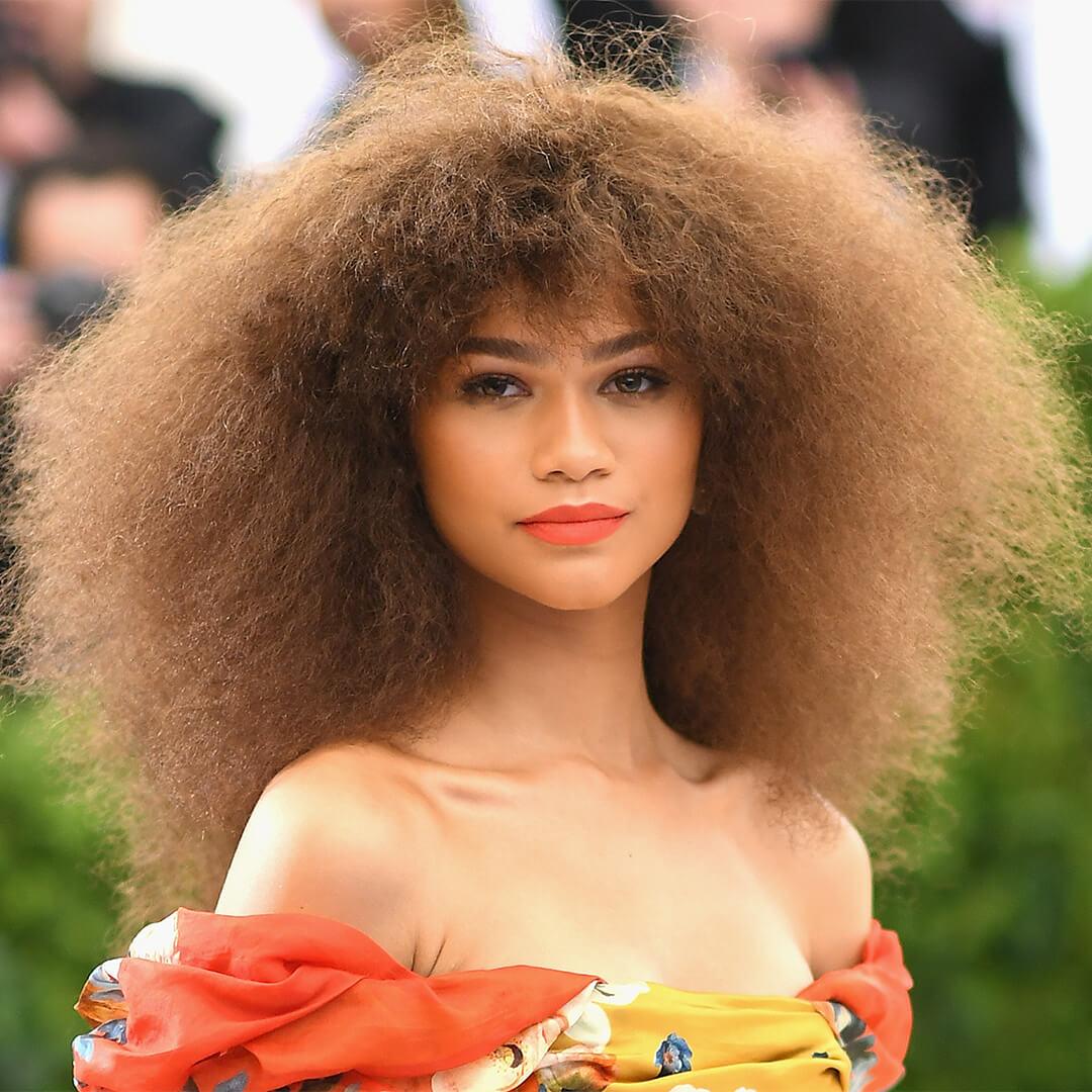 Voluminous Light Brown Afro With Layers Voluminous Light Brown Afro With Layers — Trendy Natural Hair Hairstyles