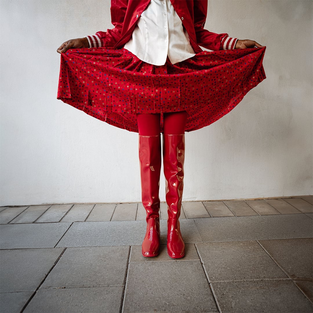 Shiny Red Boots With Matching Skirt And Jacket — Trendy Red Boots Outfit