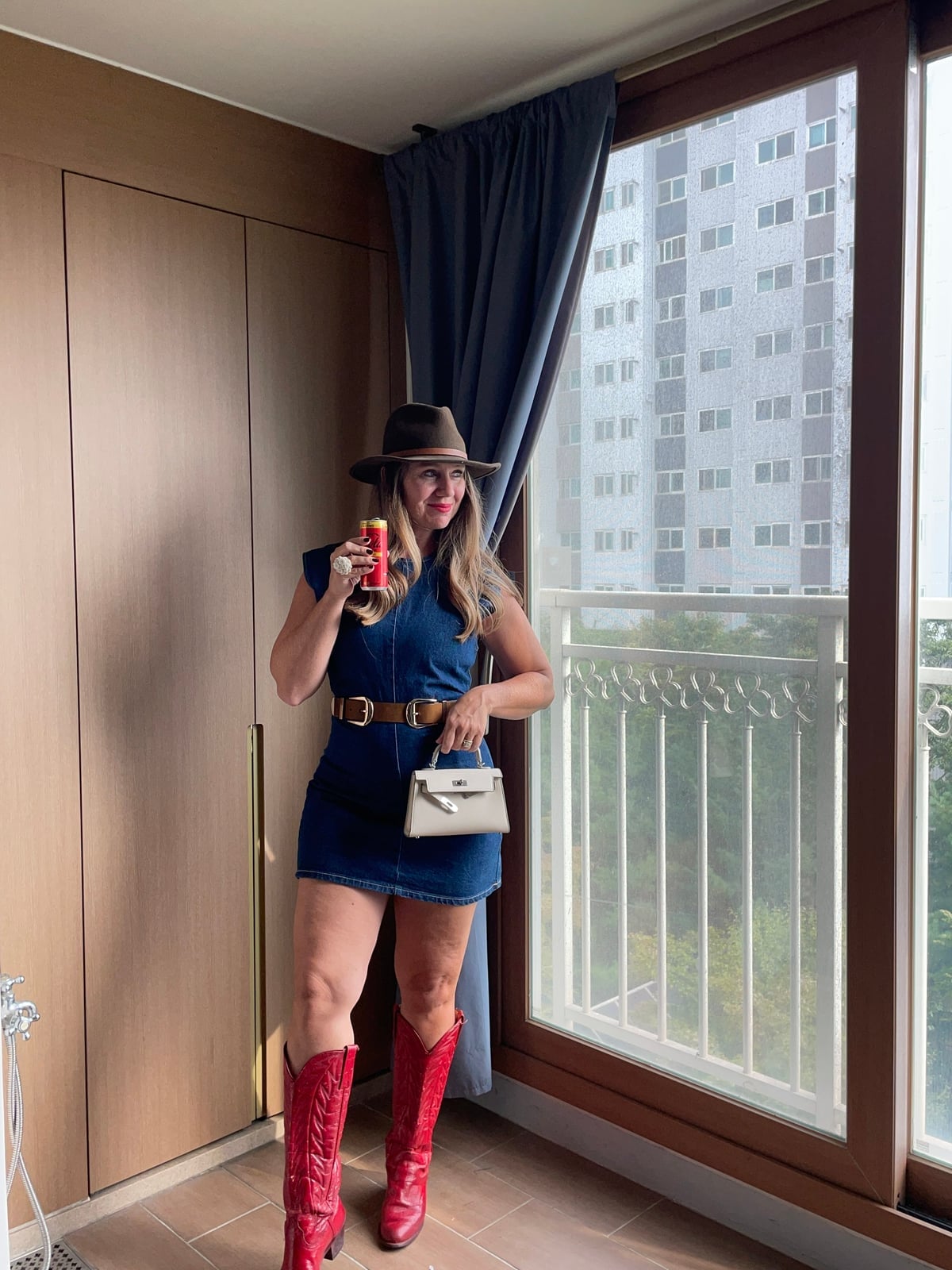 Red Cowboy Boots With Blue Denim Dress — Trendy Red Boots Outfit