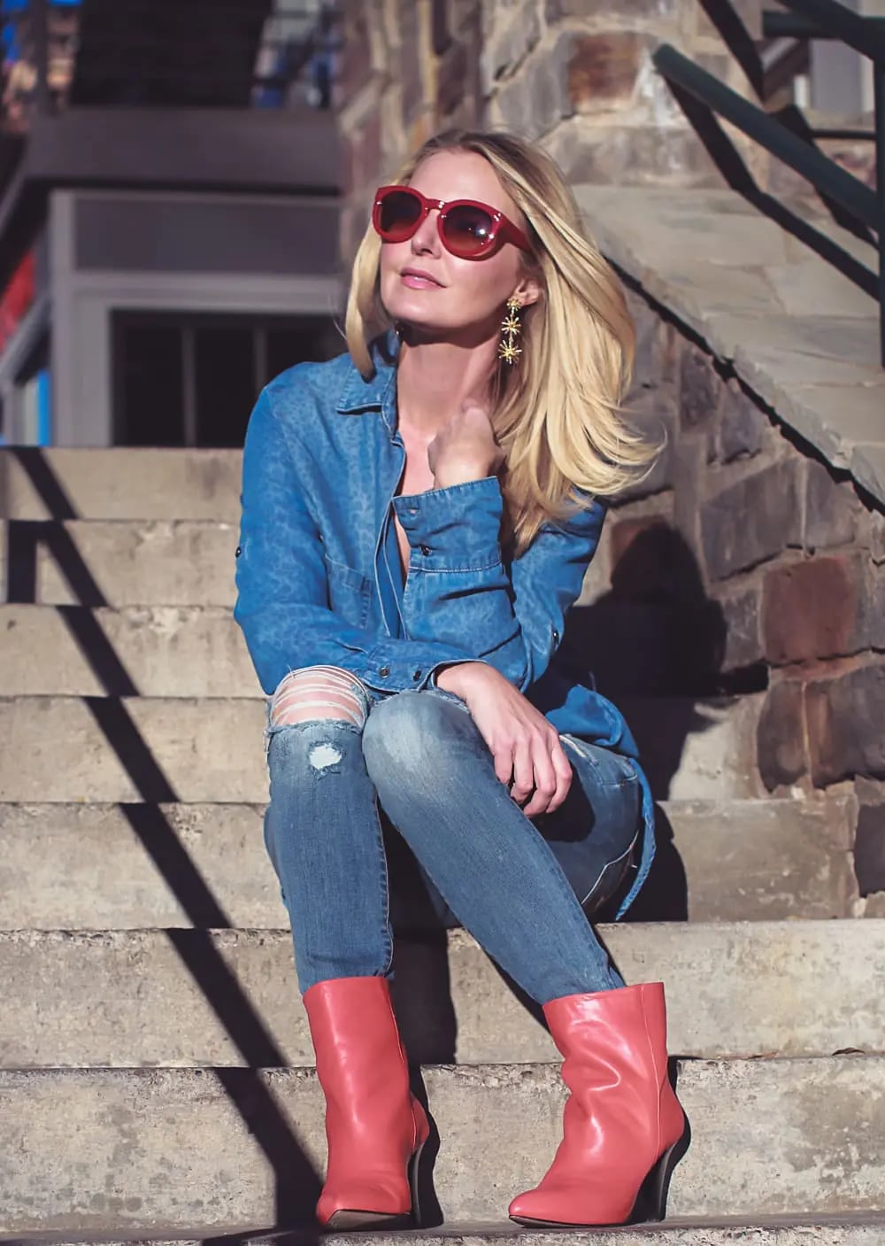 Red Ankle Boots With Denim Shirt And Distressed Jeans — Trendy Red Boots Outfit