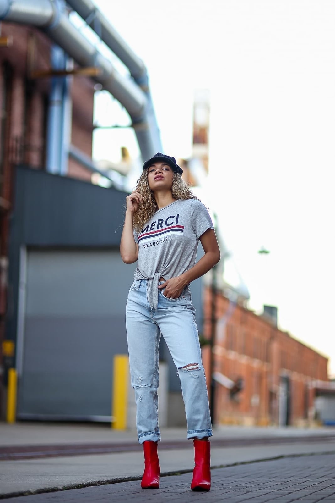 Red Ankle Boots With Ripped Jeans And Gray T-shirt — Trendy Red Boots Outfit