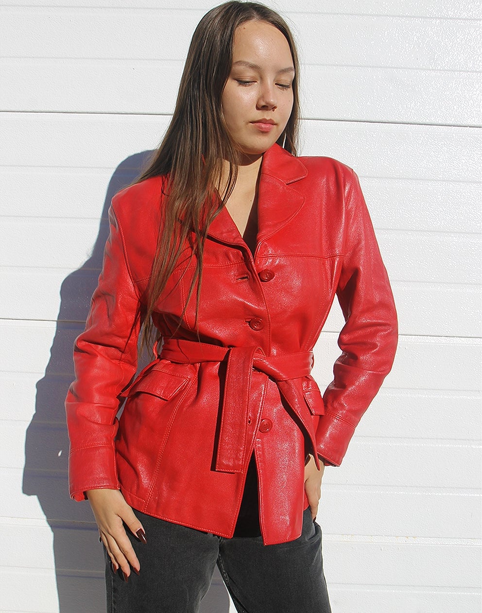 Belted Red Leather Jacket Over Dark Top And Gray Trousers Belted Red Leather Jacket Over Dark Top And Gray Trousers — Trendy Red Leather Jacket Outfit
