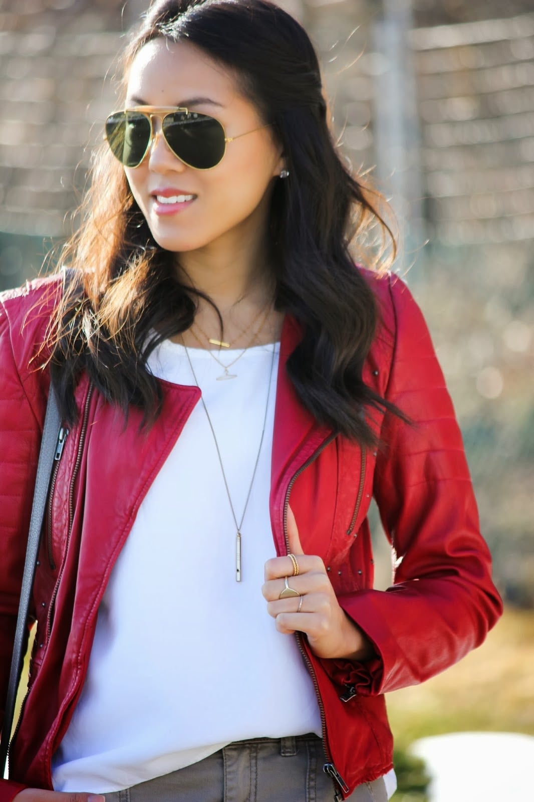 Fitted Red Leather Jacket With Silver Hardware And White Top Fitted Red Leather Jacket With Silver Hardware And White Top — Trendy Red Leather Jacket Outfit