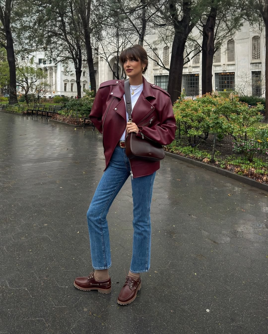 Burgundy Oversized Leather Jacket With White Tee And Blue Jeans Burgundy Oversized Leather Jacket With White Tee And Blue Jeans — Trendy Red Leather Jacket Outfit