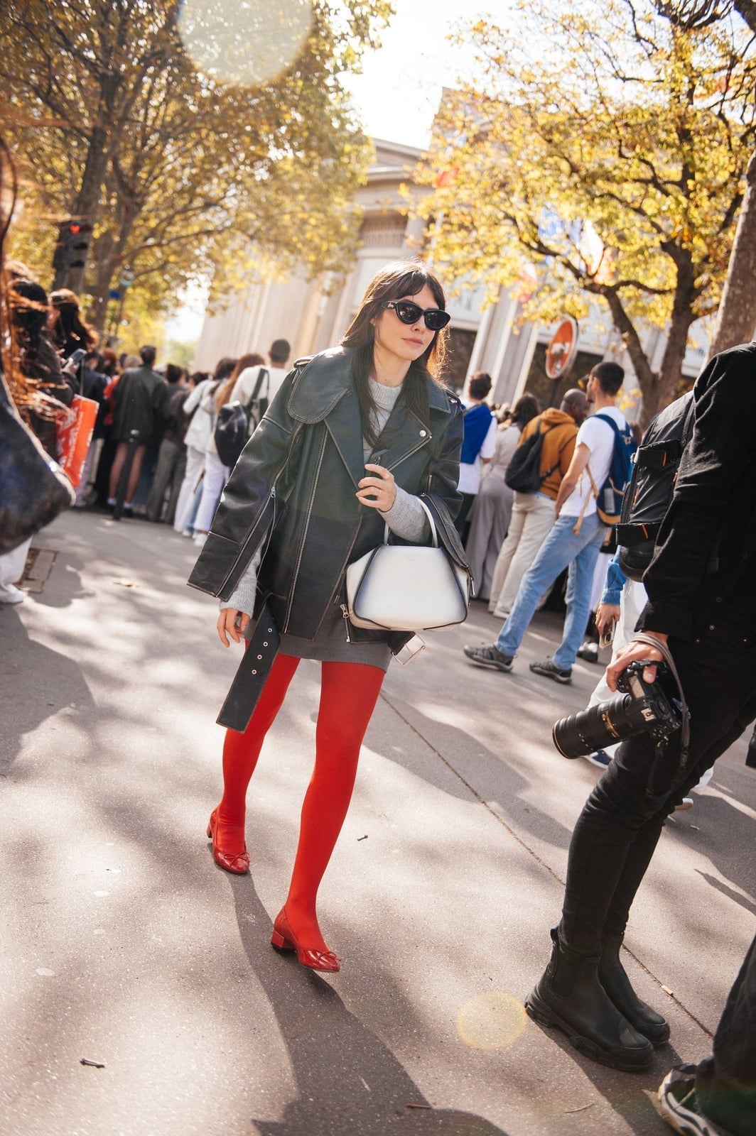 Opaque Red Tights With Gray Sweater And Black Jacket — Trendy Red Tights Outfit