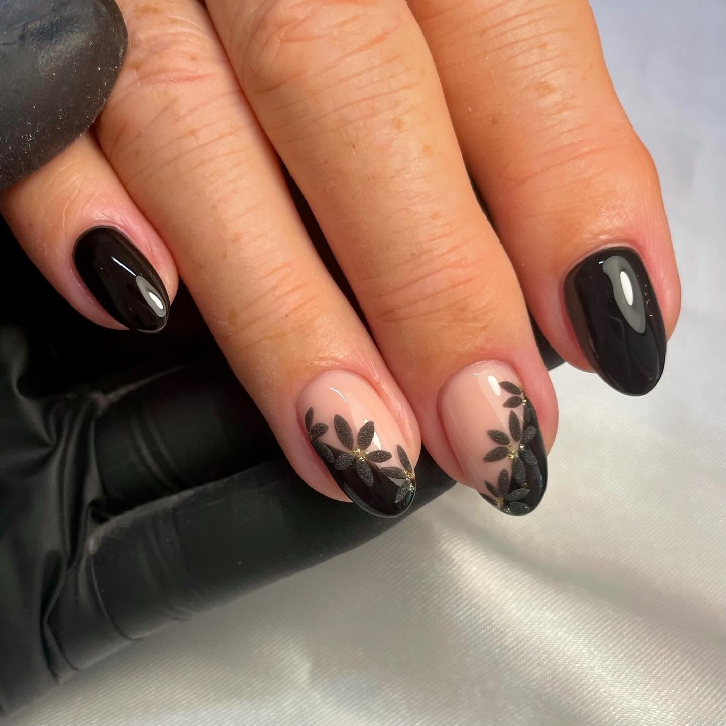 Glossy Black Oval Nails With Nude Floral Decals — Trendy Short Black Nails