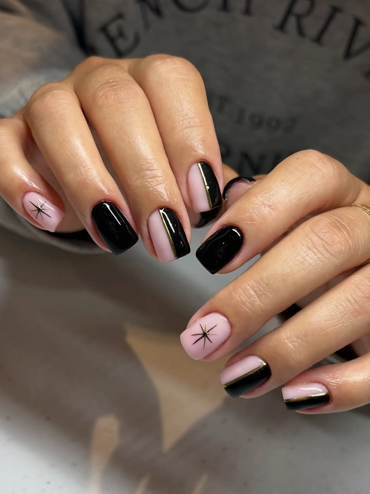 Short Square Nails With Gold Lines And Stars — Trendy Short Black Nails