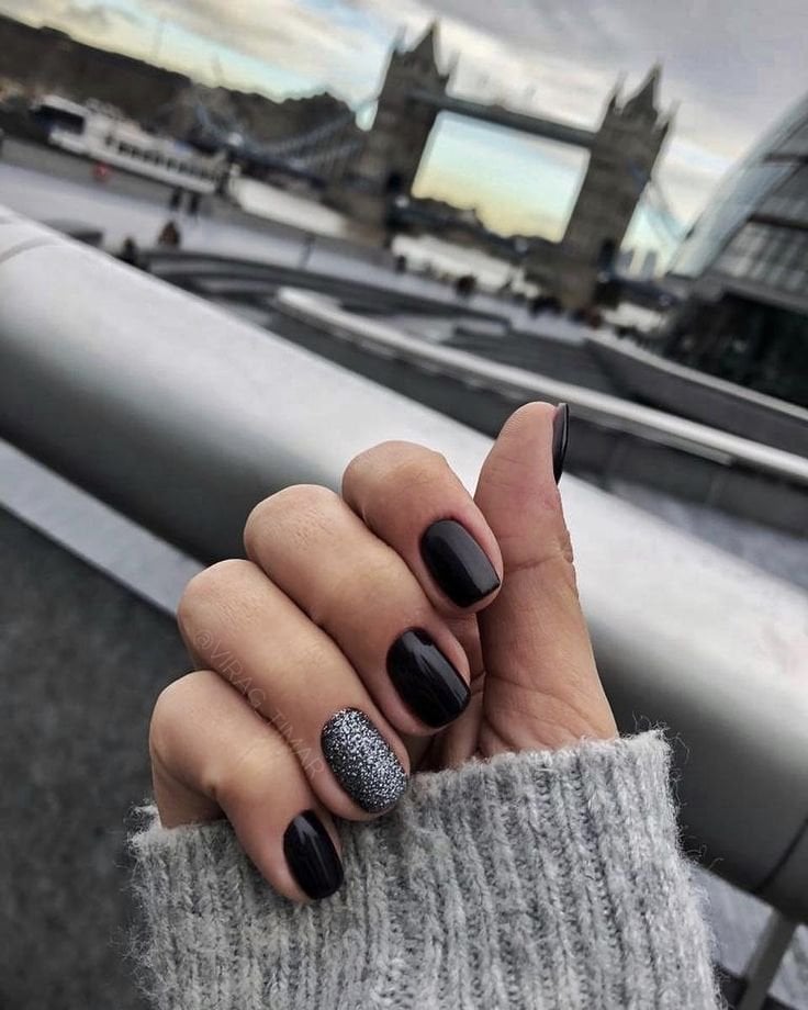 Glossy Black Short Oval Nails With Silver Glitter Accent — Trendy Short Black Nails