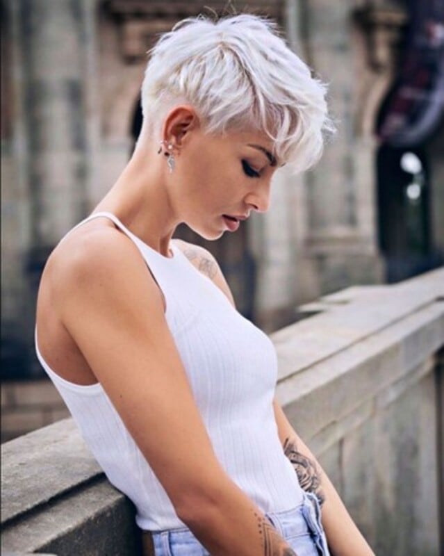 Wavy Platinum Pixie With Tousled Fringe — Trendy Short Hair