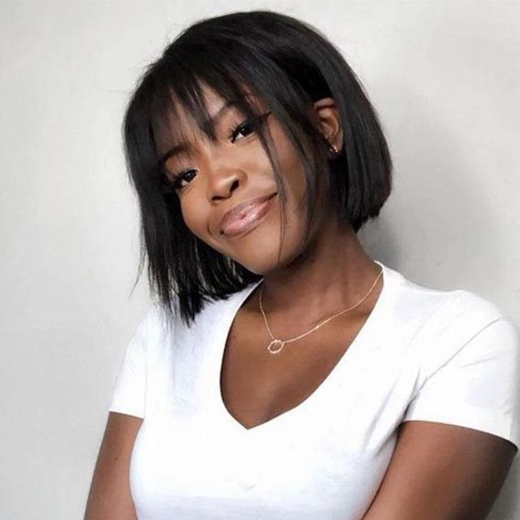 Sleek Black Bob With Blunt Fringe — Trendy Short Hair