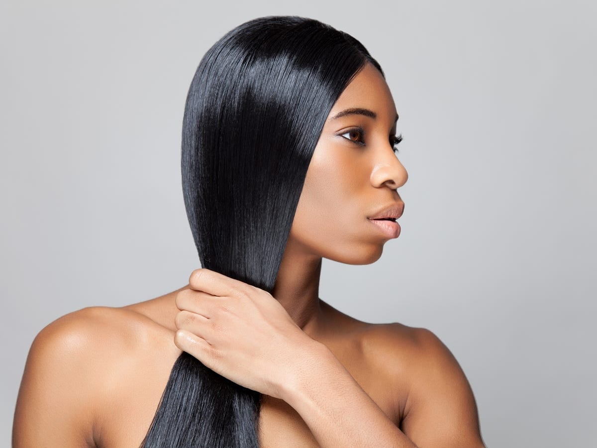 Chin-Length Blunt Bob With Glossy Black Finish, Curtain Bangs — Trendy Silk Press