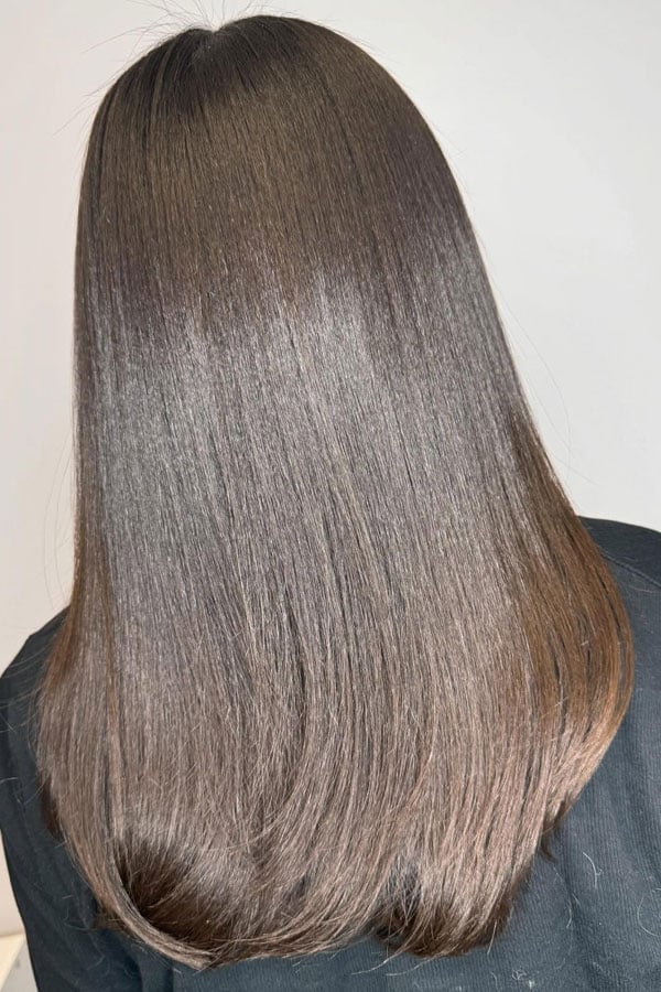 Mid-Back Straight Hair With Subtle Layers — Trendy Silk Press