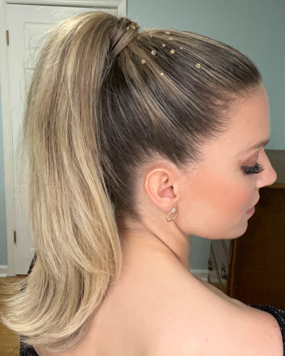 Blonde Ponytail With Rhinestone Embellishments — Trendy Slick Back Ponytail