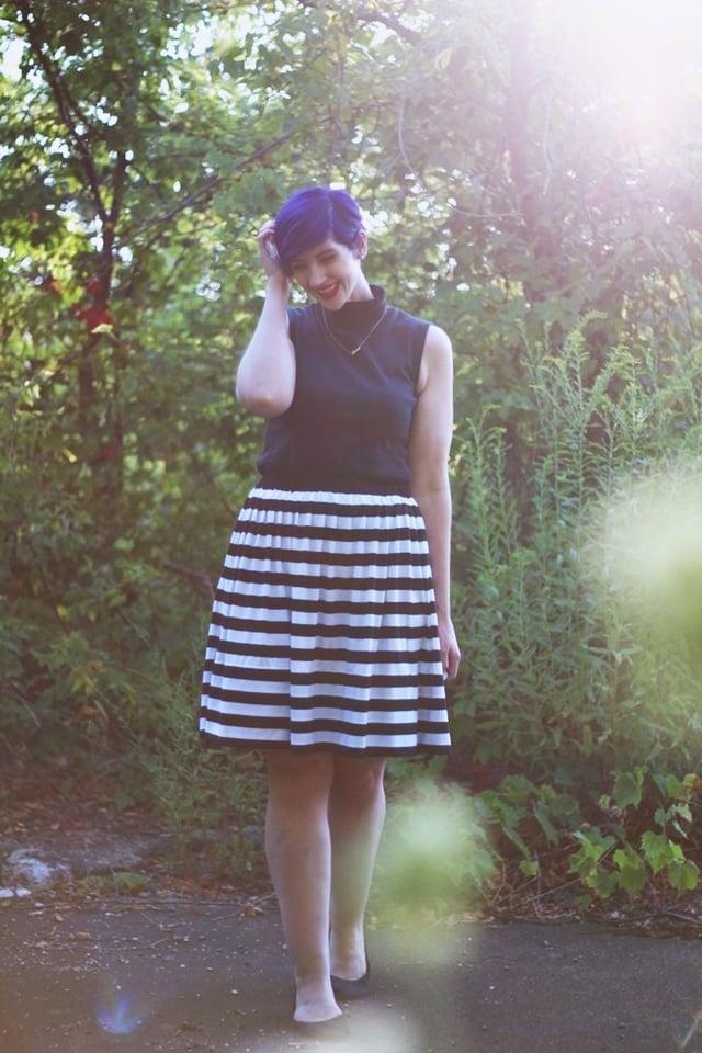 Black And White Striped A-Line Skirt With Turtleneck, Close-Up Take — Trendy Striped Skirt Outfit