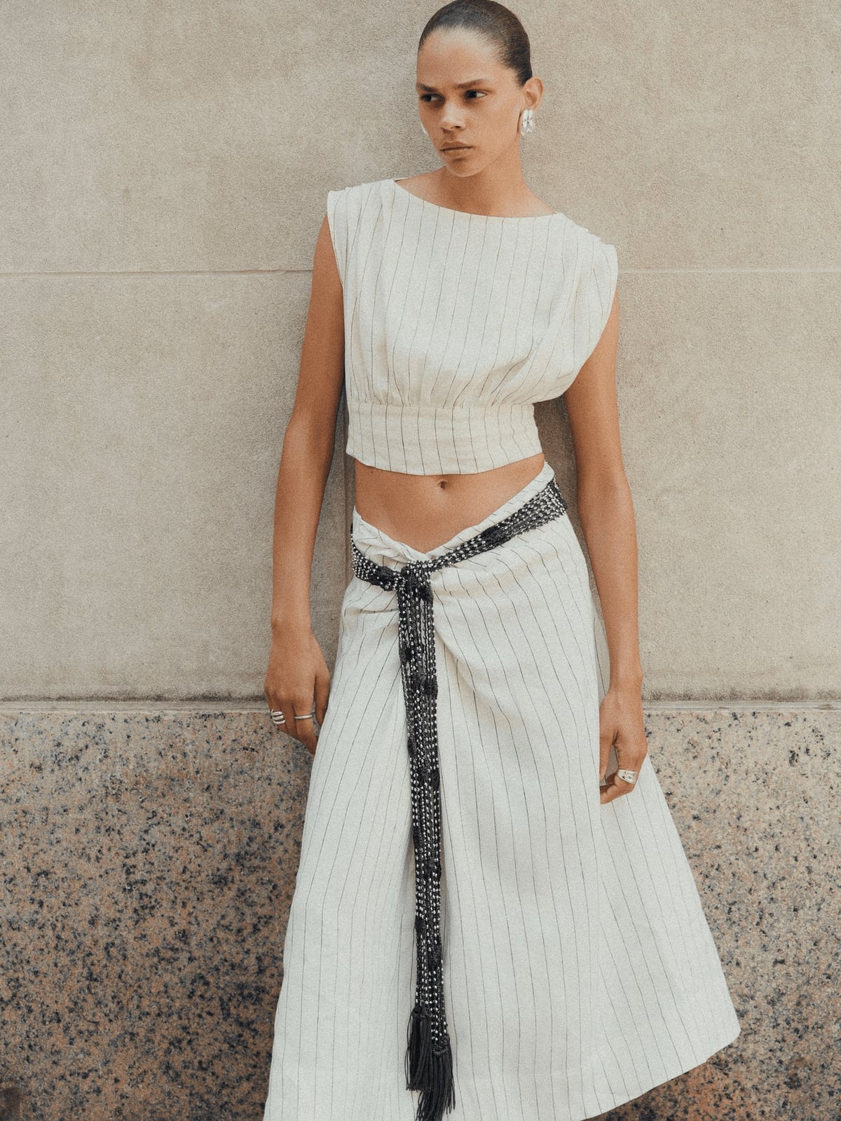White And Black Striped Wrap Skirt With Sleeveless Crop, Close-Up Take — Trendy Striped Skirt Outfit