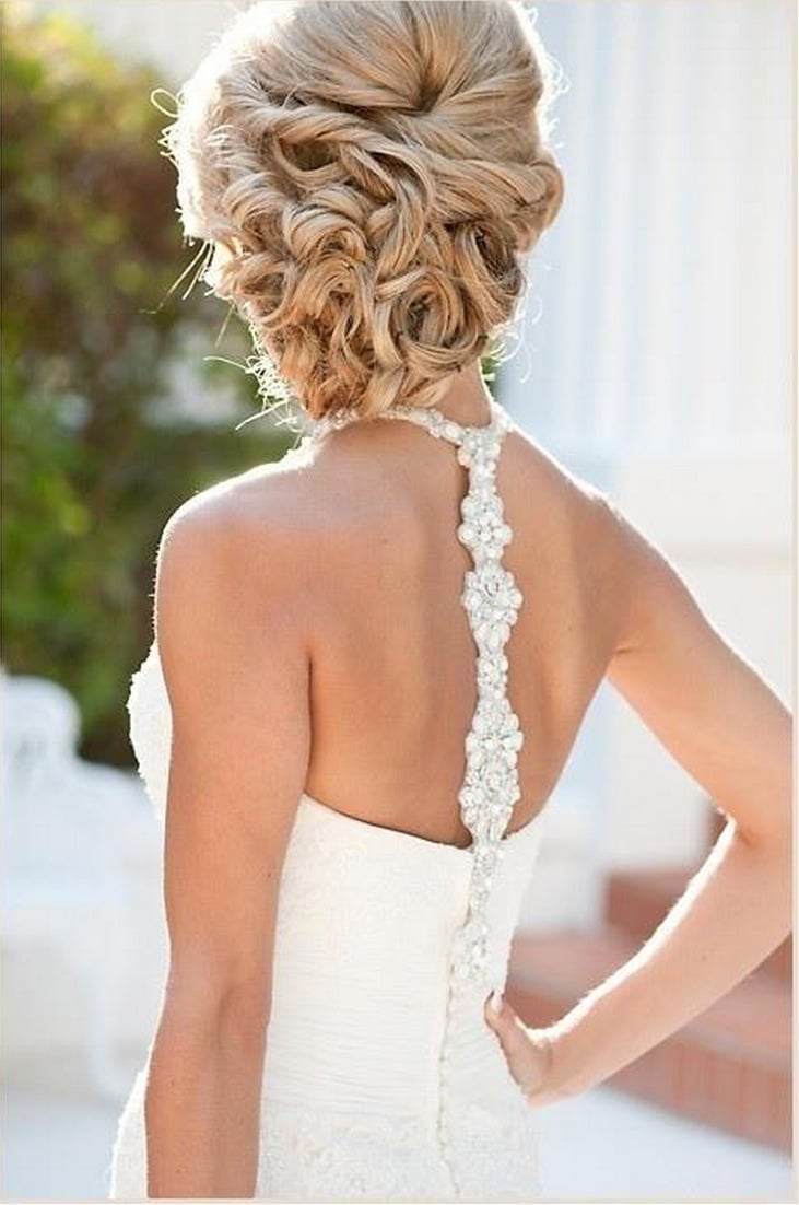 Light Blonde High Voluminous Bun With Curls — Trendy Wedding Bun