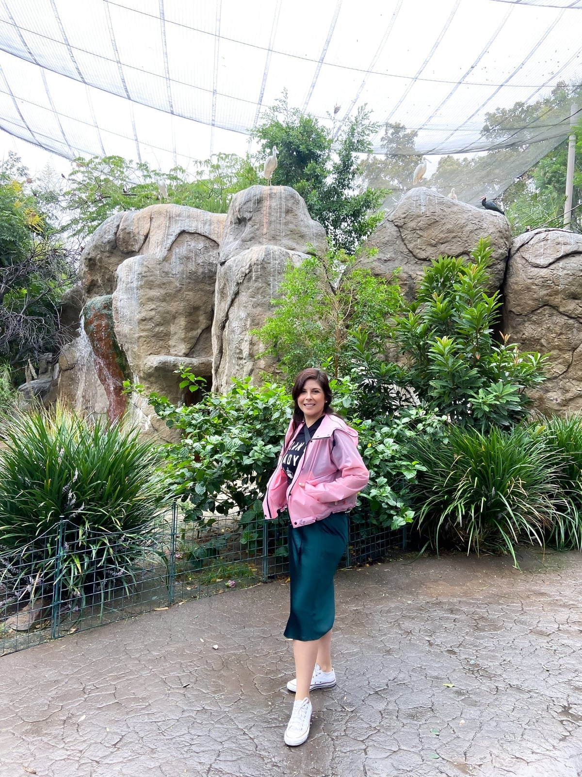 Pink bomber jacket over graphic tee and satin skirt Pink bomber jacket over graphic tee and satin skirt — Zoo Outfits